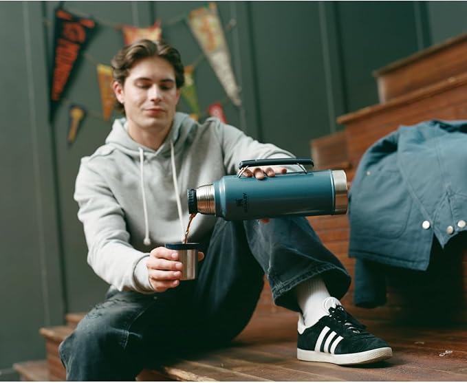 Stanley Classic Legendary Vacuum Bottle 20 oz | Wide Mouth with Leakproof Cup Lid | Keep Drinks Hot or Cold | Packable for Travel | Insulated Stainless Steel Thermos | BPA-Free | Black 2.0