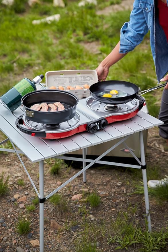 Coleman Fold N Go 2-Burner Propane Camping Stove Portable Folding Camp Stove with Push-Button Instant Ignition 2 Adjustable Burners with Pressure Control and 20000 BTUs of Power